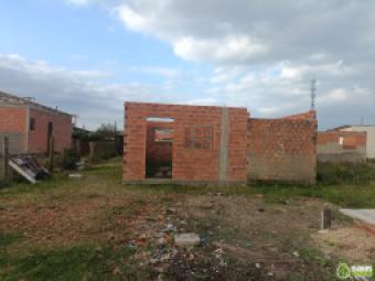 Terreno com construção